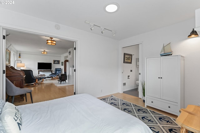 4624 Joshua Ln, Florence, OR 97439 - bedroom with light wood-type flooring