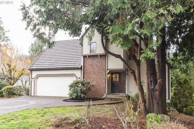 view of front of property featuring a garage