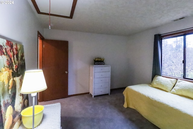 bedroom featuring dark carpet