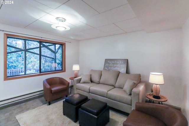 carpeted living room featuring a baseboard radiator