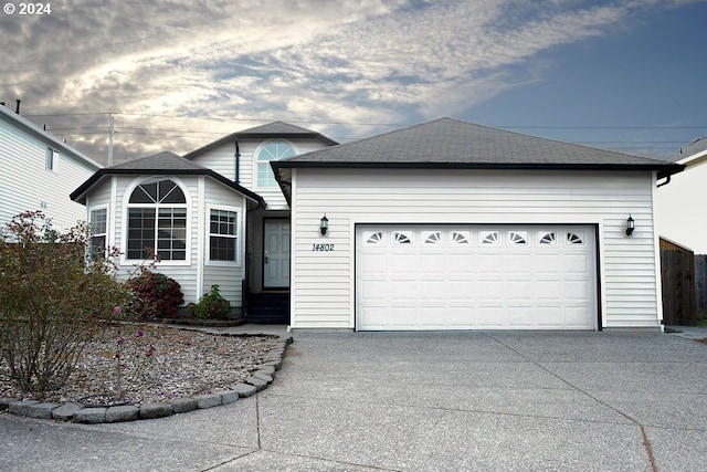 single story home with a garage