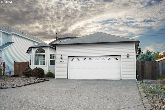 view of side of home with a garage