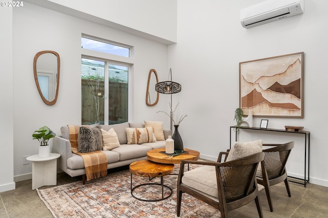 living room featuring an AC wall unit