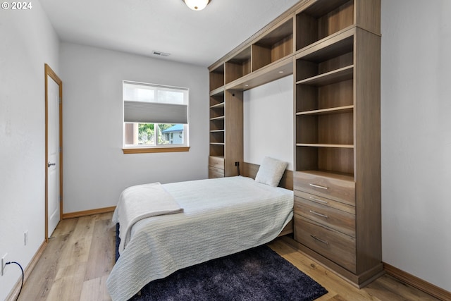 bedroom featuring light wood-type flooring