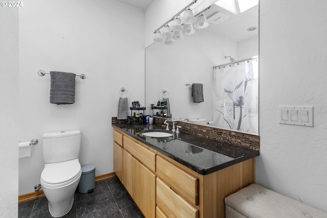 bathroom with walk in shower, tile patterned flooring, vanity, and toilet