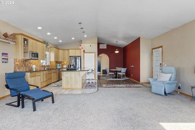 interior space with lofted ceiling and sink