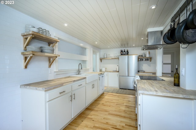 kitchen with wood ceiling, white appliances, sink, light hardwood / wood-style flooring, and white cabinets