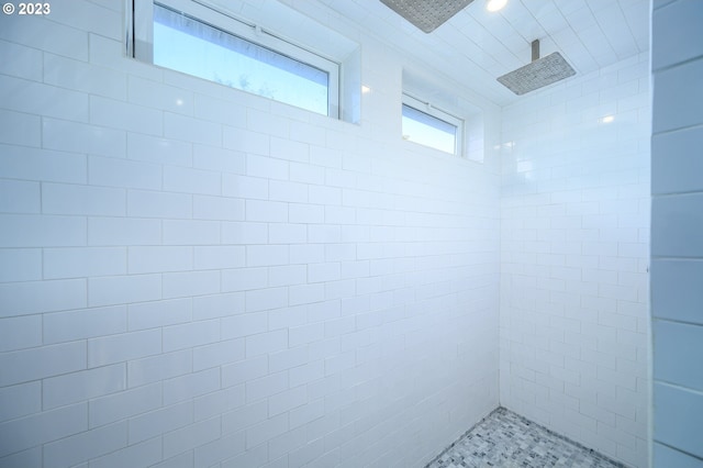 interior space featuring a tile shower