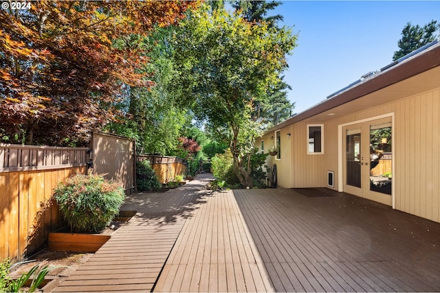 wooden deck featuring french doors