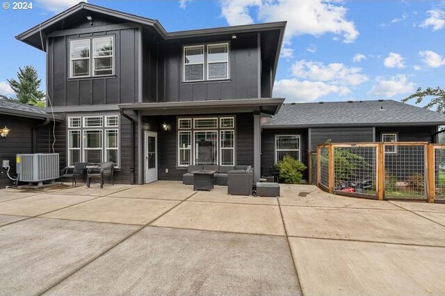 back of house with a patio