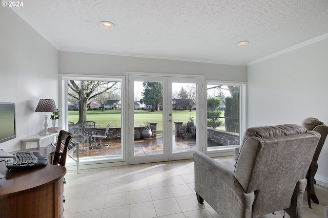 interior space featuring ornamental molding, french doors, a textured ceiling, and light tile patterned floors