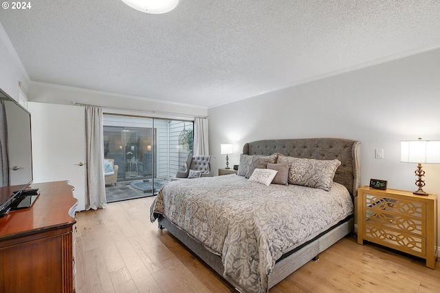 bedroom featuring crown molding, access to outside, a textured ceiling, and light wood-type flooring