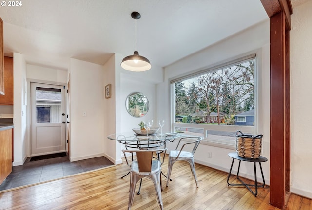 dining area with hardwood / wood-style flooring