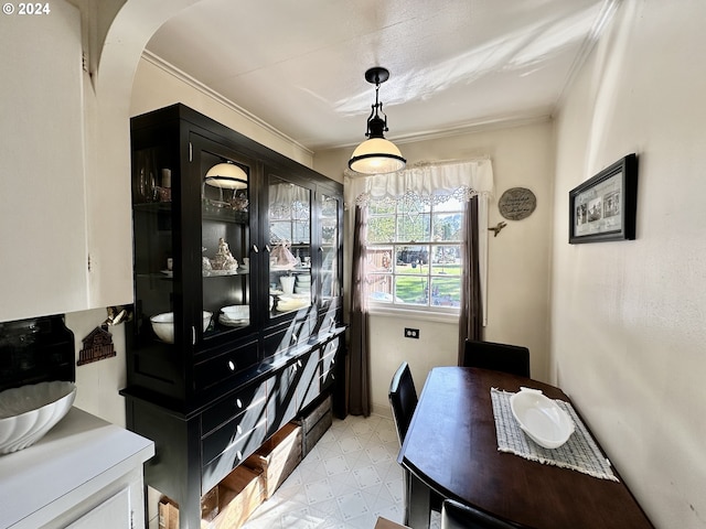 interior space featuring crown molding