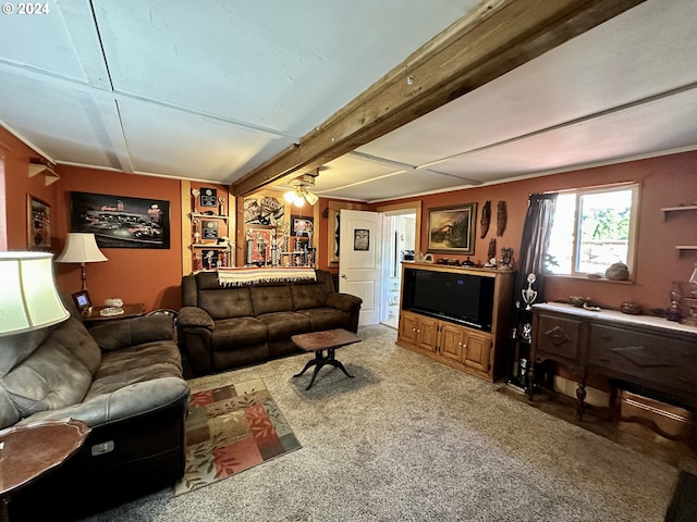 living room with carpet floors and beamed ceiling