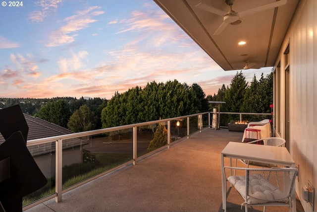 balcony at dusk with ceiling fan