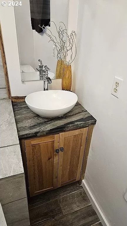 43460 Nicholson Dr, Port Orford, OR 97465 - bathroom featuring vanity and baseboards