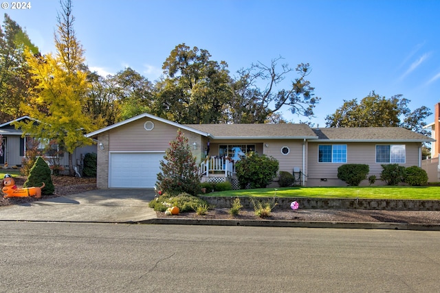 ranch-style home featuring a garage