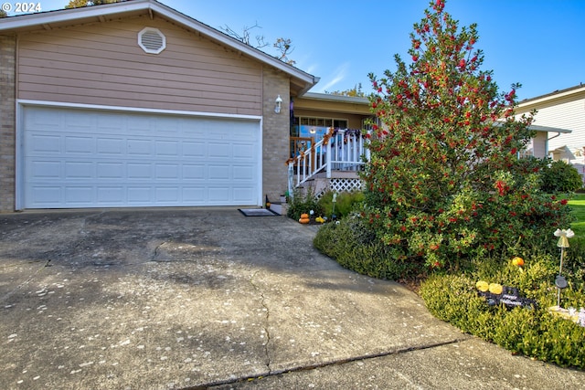 single story home with a garage