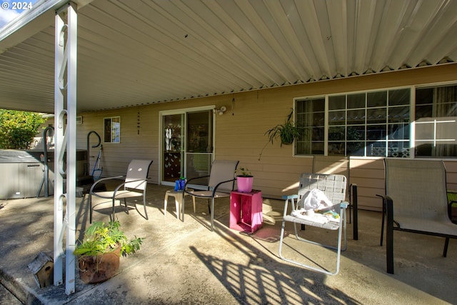 view of patio with a storage unit