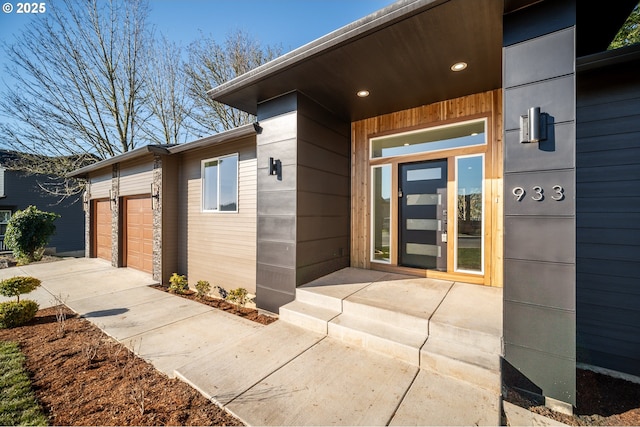 entrance to property featuring a garage