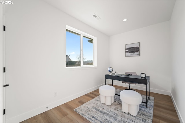 office area with hardwood / wood-style floors