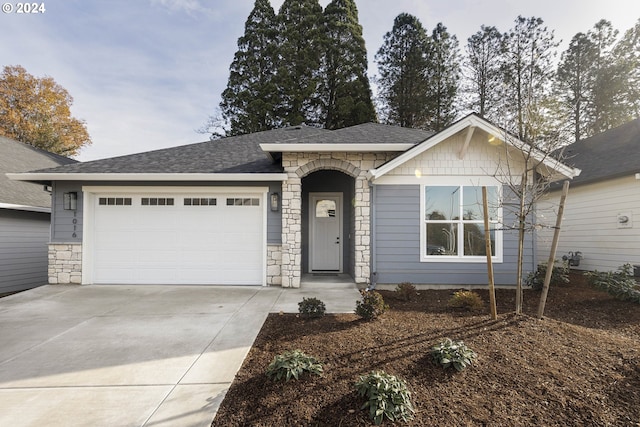 ranch-style home with a garage