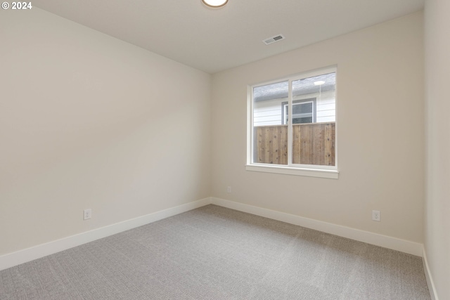 view of carpeted spare room