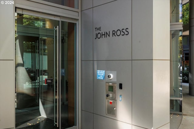doorway to property featuring elevator