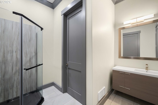 bathroom with walk in shower, vanity, tile patterned floors, and ornamental molding