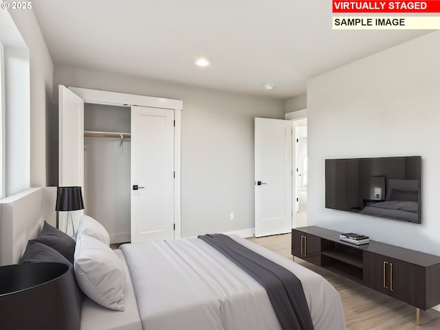 2854 NE Sweetwater Rd, Estacada, OR 97023 - bedroom featuring light wood finished floors, baseboards, recessed lighting, and a closet