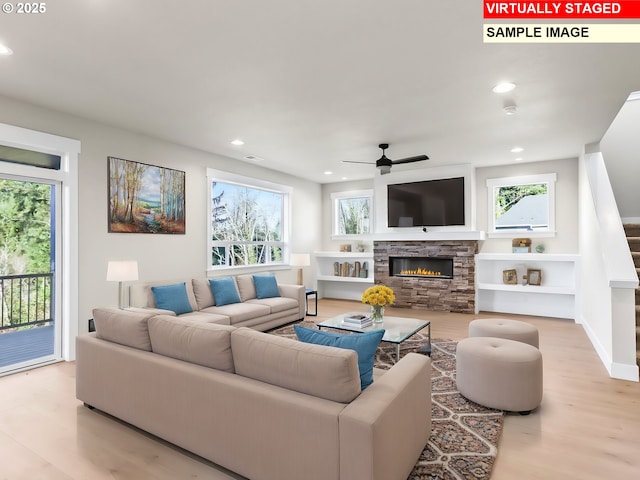 2854 NE Sweetwater Rd, Estacada, OR 97023 - living area featuring ceiling fan, recessed lighting, wood finished floors, and a fireplace