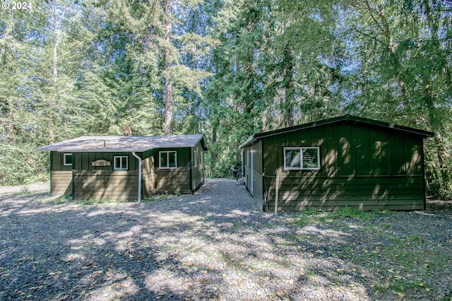 ranch-style house with an outbuilding