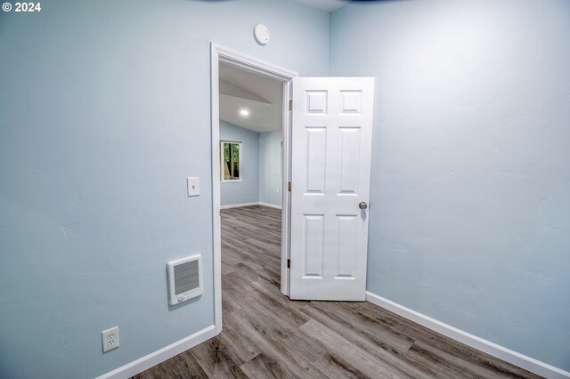 hall with light wood-type flooring