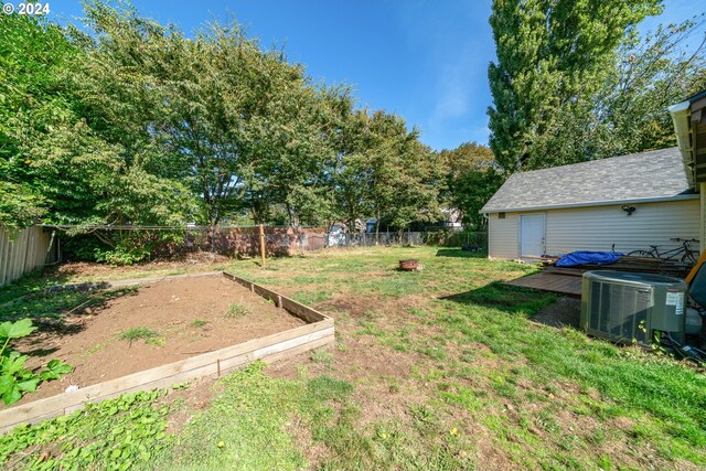 view of yard featuring central AC