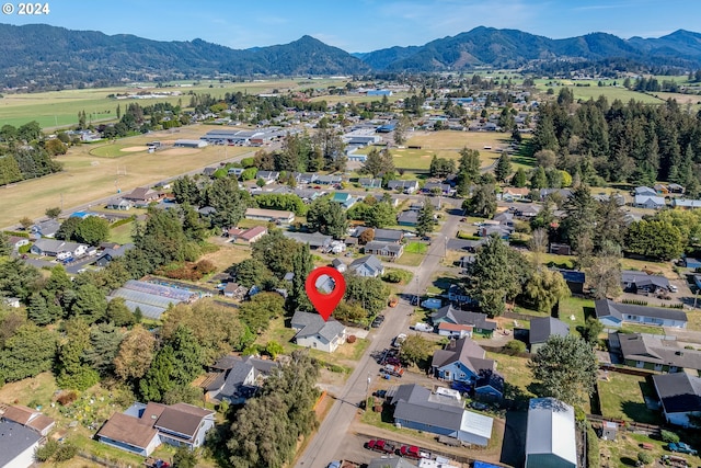 bird's eye view with a mountain view