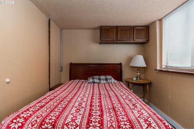 bedroom with a textured ceiling