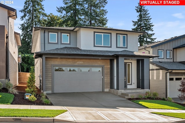 prairie-style home featuring a garage