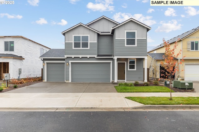 1353 NE Josephine Ct Unit 167, Estacada, OR 97023 - traditional home featuring board and batten siding, concrete driveway, and an attached garage