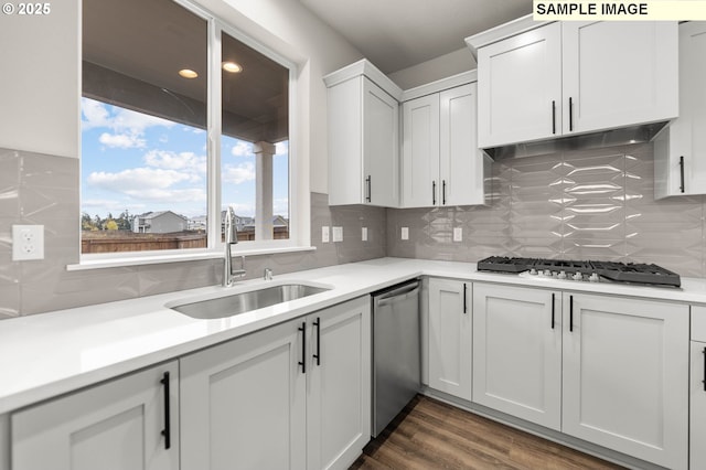 1353 NE Josephine Ct Unit 167, Estacada, OR 97023 - kitchen with tasteful backsplash, a sink, appliances with stainless steel finishes, and light countertops
