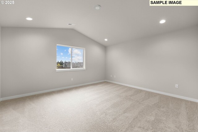1353 NE Josephine Ct Unit 167, Estacada, OR 97023 - empty room with baseboards, recessed lighting, carpet, and vaulted ceiling