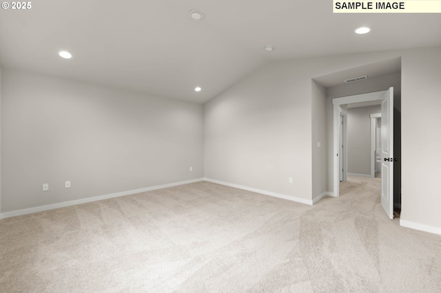 1353 NE Josephine Ct Unit 167, Estacada, OR 97023 - unfurnished room with recessed lighting, light colored carpet, baseboards, visible vents, and lofted ceiling