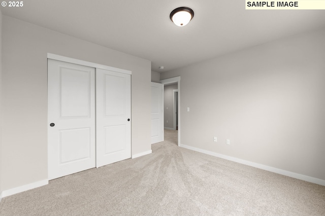 1353 NE Josephine Ct Unit 167, Estacada, OR 97023 - unfurnished bedroom featuring a closet, baseboards, and carpet floors