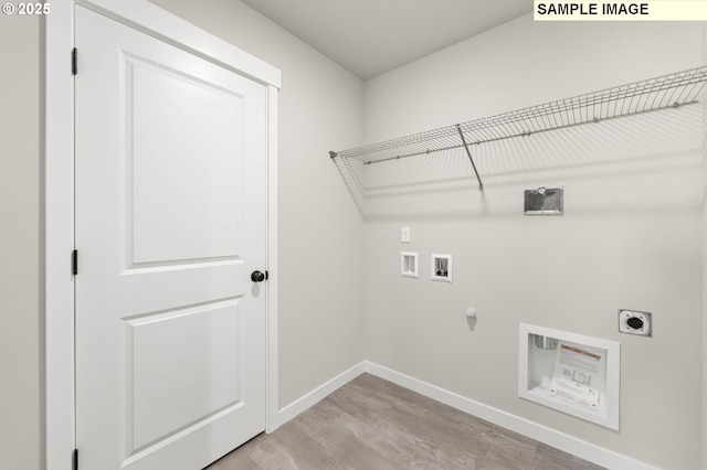 1353 NE Josephine Ct Unit 167, Estacada, OR 97023 - laundry room with hookup for an electric dryer, laundry area, light wood-type flooring, hookup for a washing machine, and baseboards