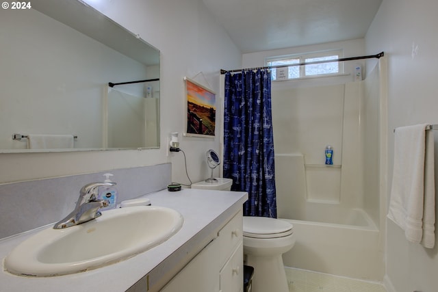 full bathroom featuring vanity, shower / bath combo with shower curtain, and toilet