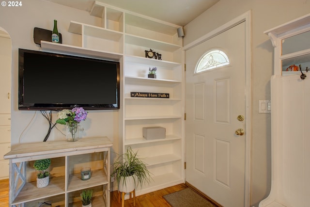 entrance foyer with hardwood / wood-style floors