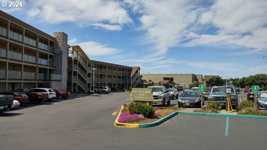 view of parking / parking lot