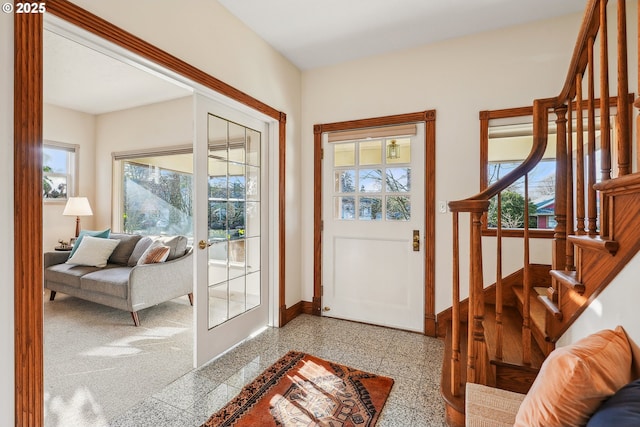 entrance foyer featuring french doors