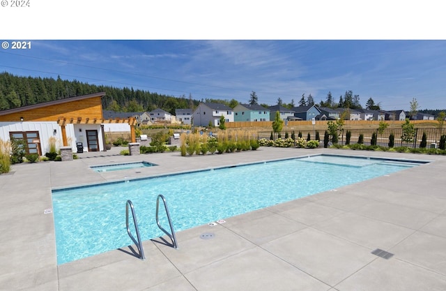 view of pool with a patio area