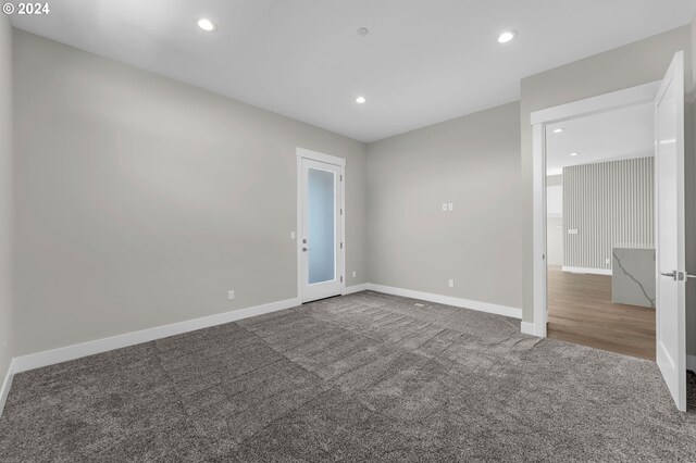 unfurnished bedroom with carpet floors